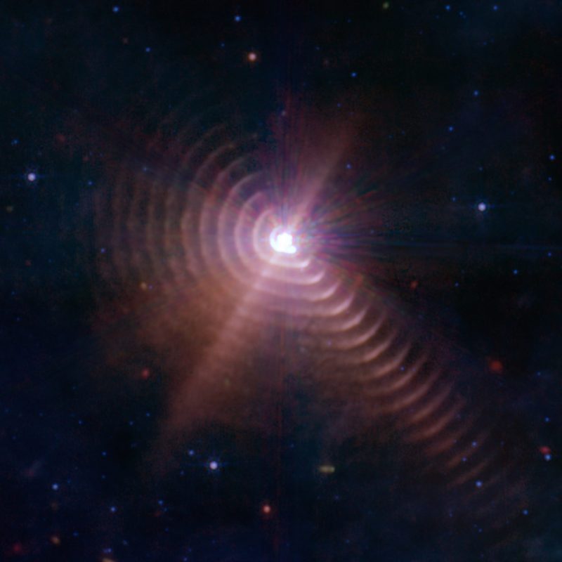 Ringed star: Bright light at center with concentric rings but not perfectly round rings.