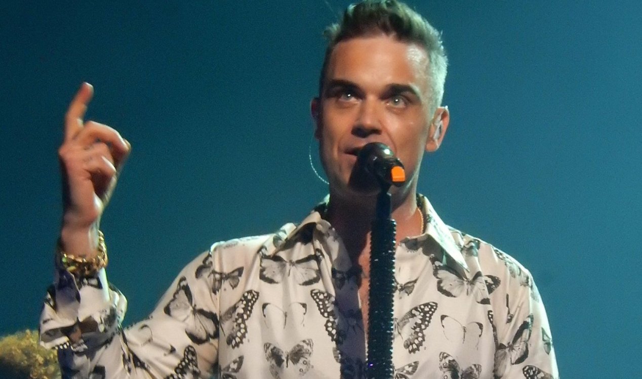 Robbie Williams considerou carreira como caçador de OVNIs depois de ver um ele mesmo